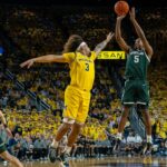 No. 14 Michigan State tops No. 12 Michigan, leads Big Ten